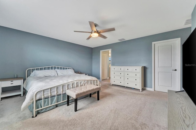 bedroom featuring light carpet and ceiling fan