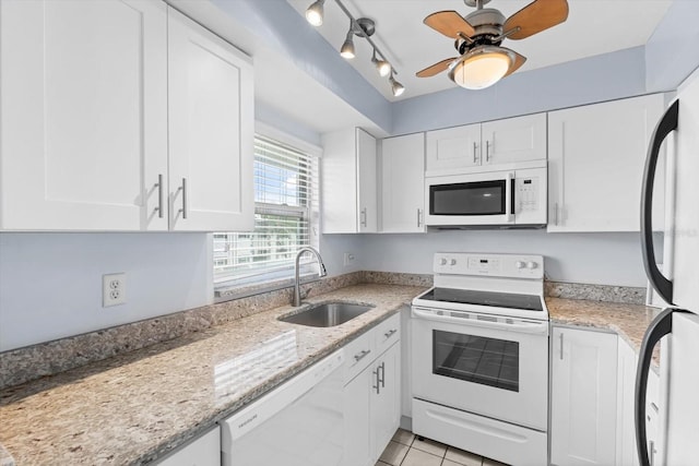 kitchen with white cabinetry, ceiling fan, white appliances, sink, and track lighting