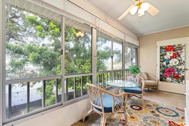 sunroom / solarium with ceiling fan