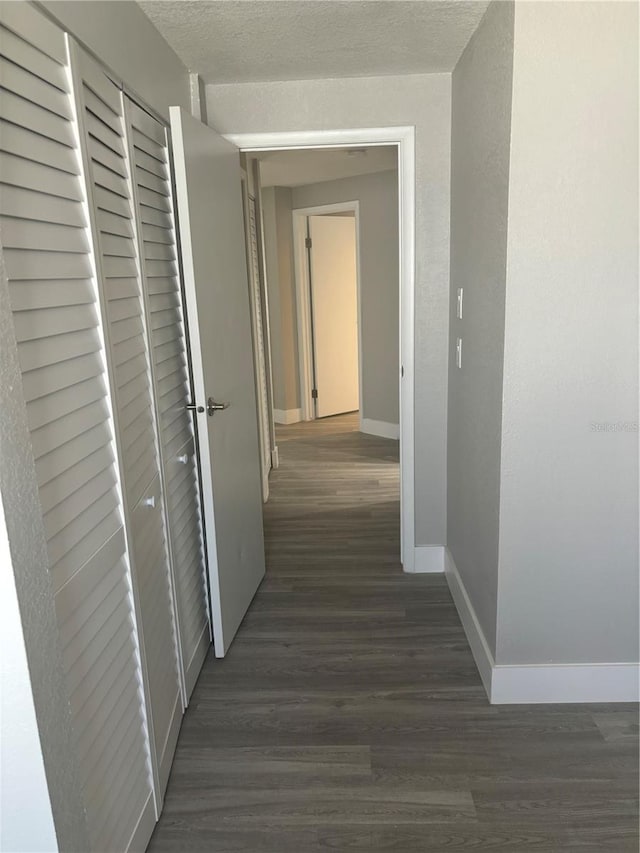 hallway featuring hardwood / wood-style flooring