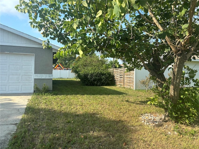 view of yard with a garage