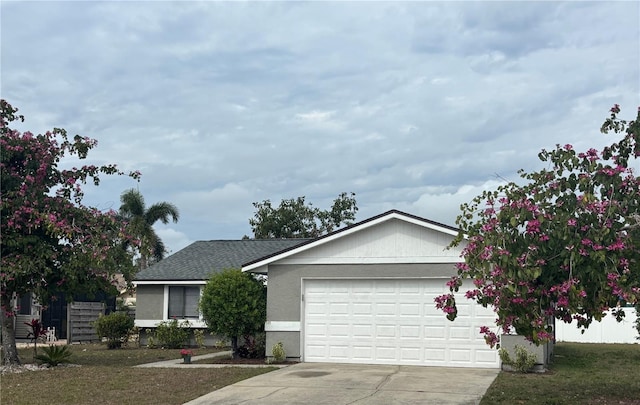 ranch-style house featuring a garage