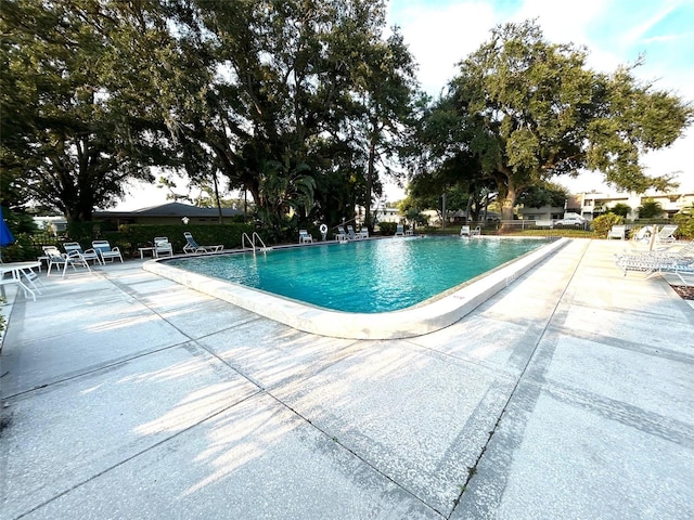 view of pool with a patio