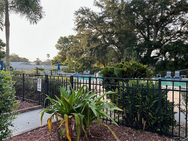 view of yard with a community pool