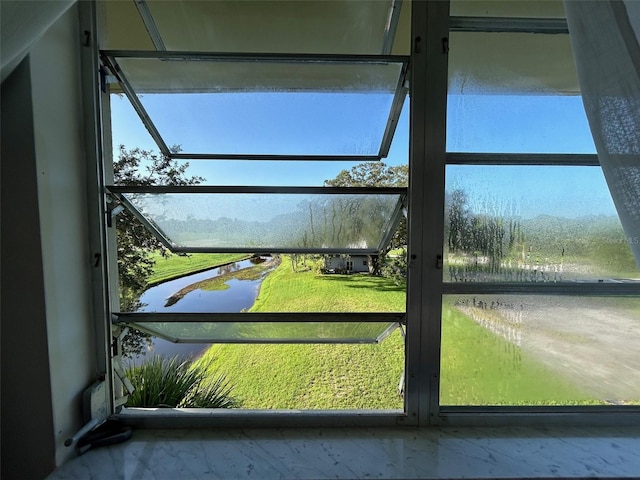 entryway with a water view