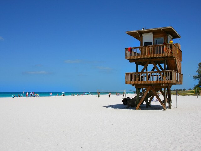 property view of water with a beach view