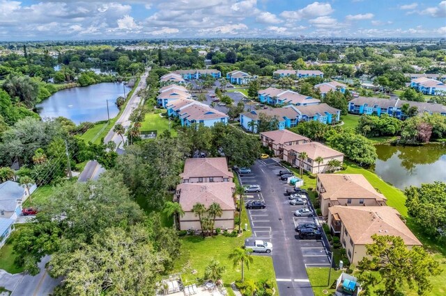 drone / aerial view with a water view