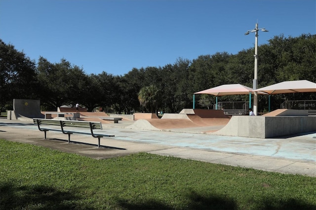 view of home's community featuring a lawn