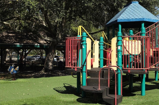 view of playground featuring a yard