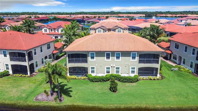 birds eye view of property with a residential view