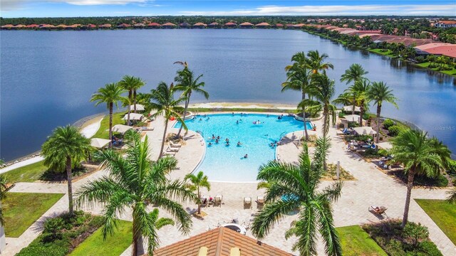 view of pool with a water view