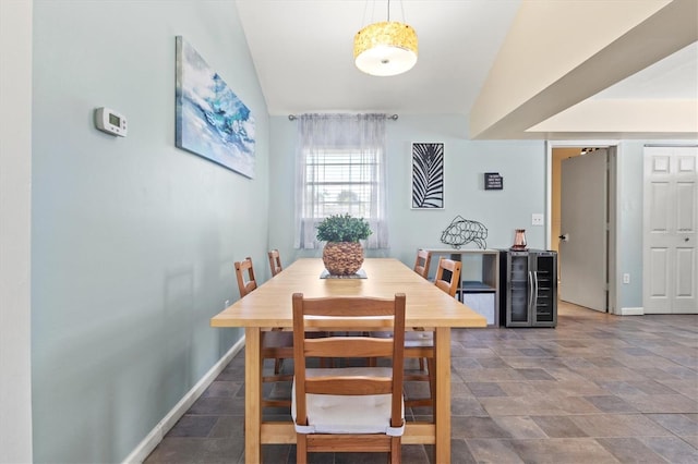 dining area with lofted ceiling