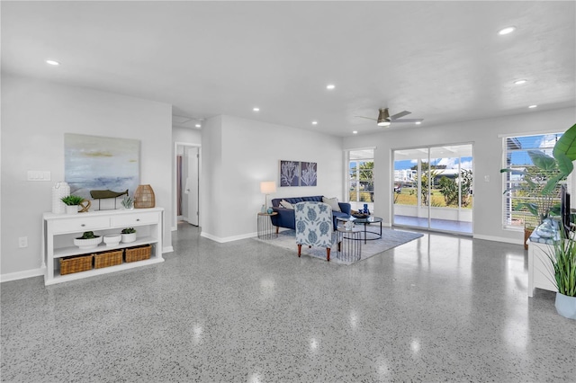 living room featuring ceiling fan