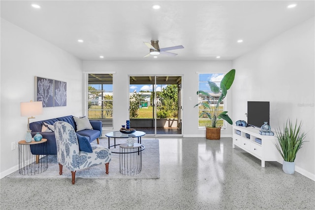 living room featuring ceiling fan