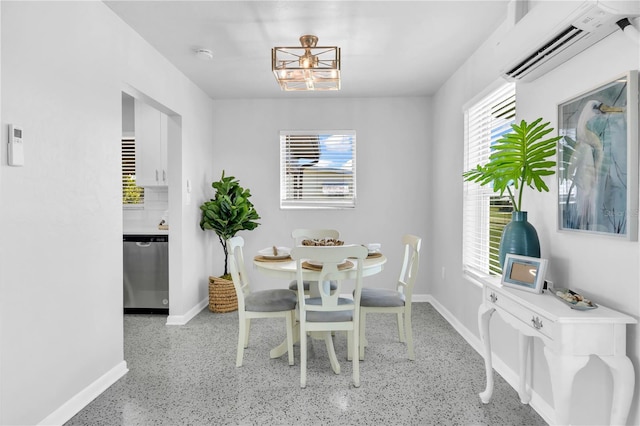 dining room with a wall unit AC