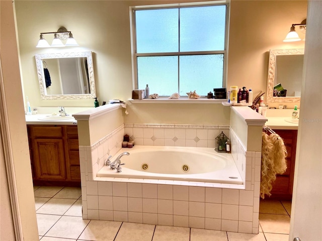 bathroom featuring double vanity, tiled tub, and tile patterned flooring