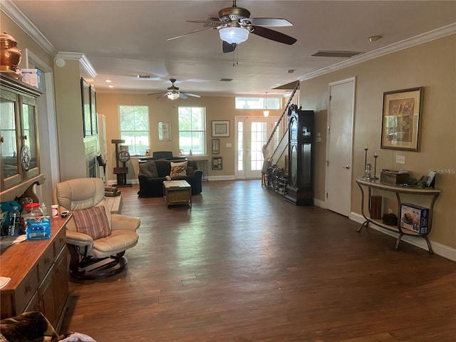 living room featuring crown molding and dark hardwood / wood-style floors