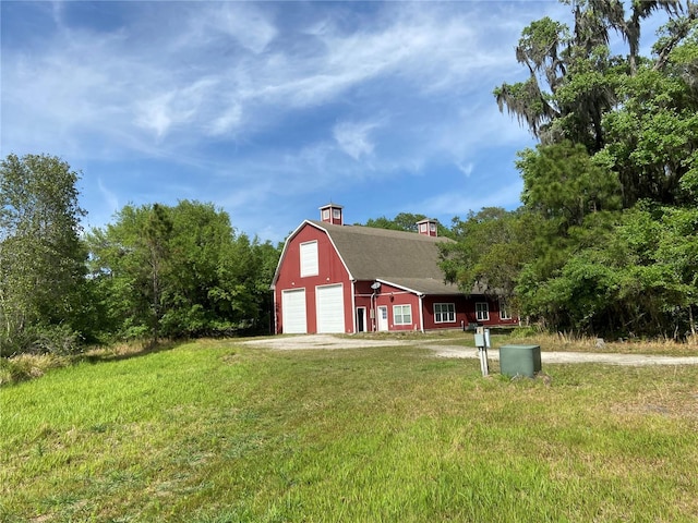 view of yard with a garage