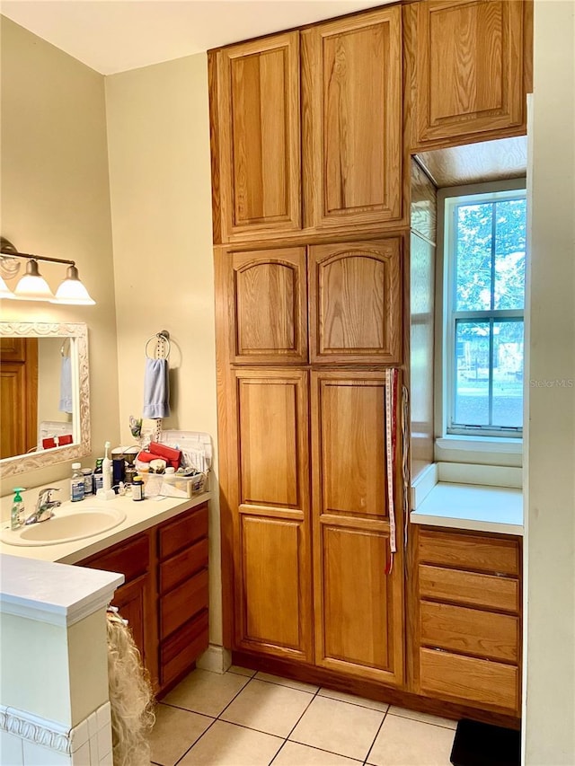 bathroom with vanity and tile patterned floors