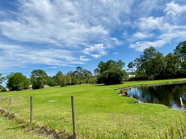 view of yard with a water view