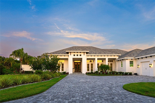 view of front of property with a garage