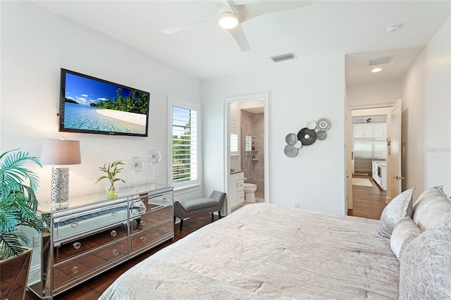 bedroom featuring ceiling fan, dark hardwood / wood-style floors, and ensuite bathroom