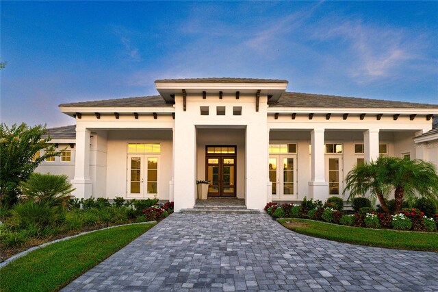 view of front facade featuring french doors