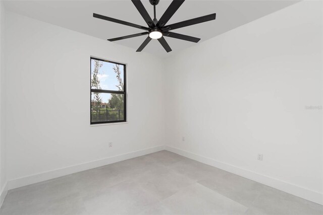 unfurnished room featuring ceiling fan