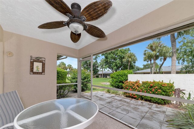 view of patio with ceiling fan