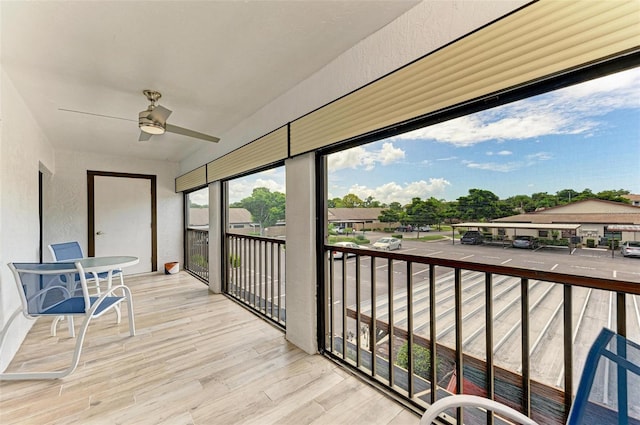 exterior space featuring ceiling fan