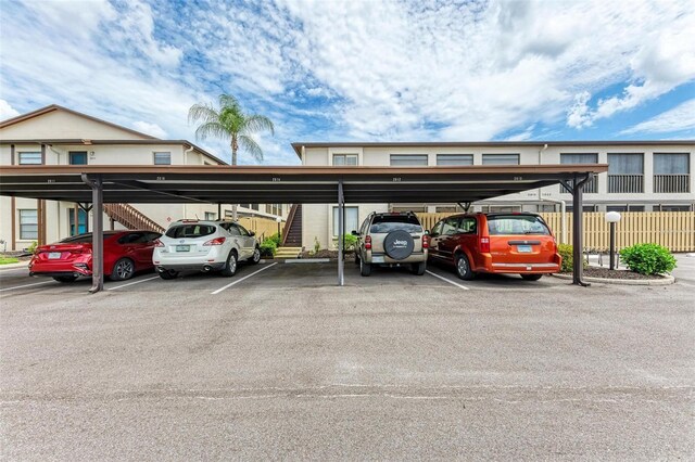 view of car parking with a carport