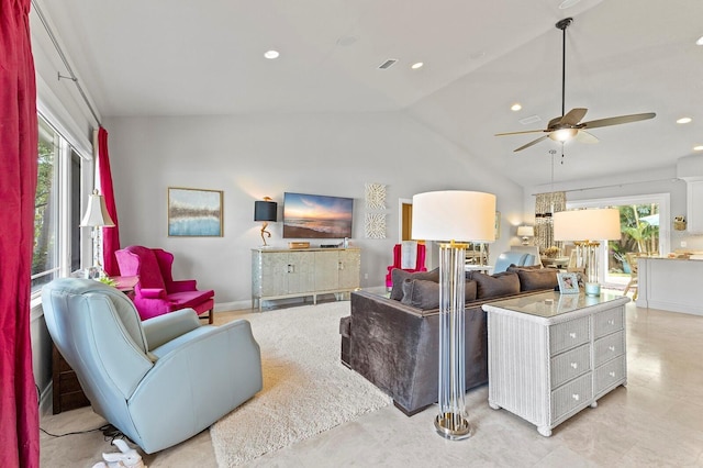 living room with high vaulted ceiling, light tile patterned floors, and ceiling fan