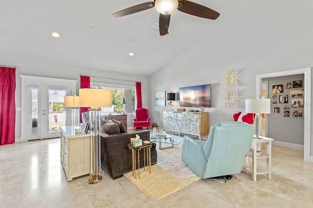 living room featuring ceiling fan and high vaulted ceiling