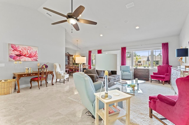 living room with high vaulted ceiling and ceiling fan