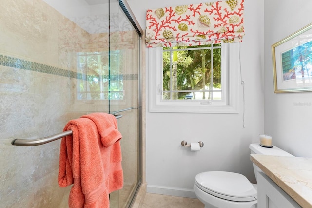 bathroom featuring vanity, toilet, tile patterned flooring, and an enclosed shower