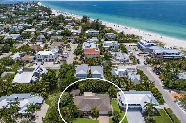 aerial view featuring a water view and a view of the beach