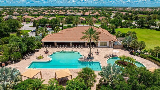 view of swimming pool featuring a patio