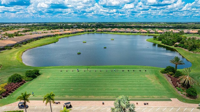 drone / aerial view with a water view