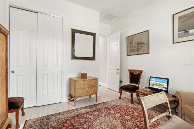 living area featuring light hardwood / wood-style floors