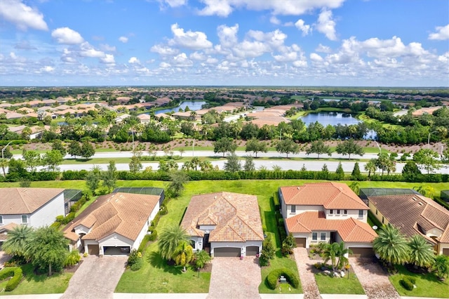 drone / aerial view with a water view