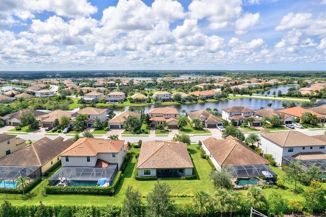 bird's eye view with a water view