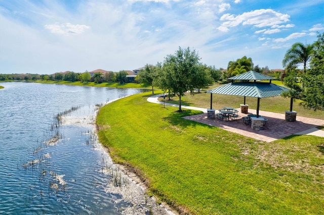 surrounding community featuring a water view, a lawn, a patio area, and a gazebo