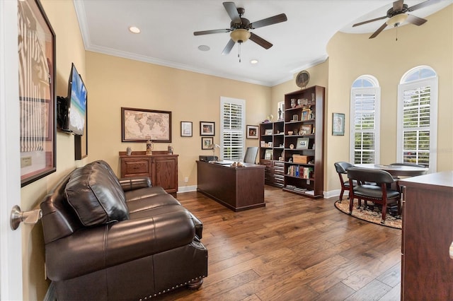 home office with ceiling fan, dark wood-type flooring, and crown molding