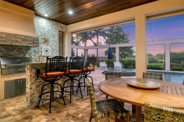 dining room featuring wood ceiling