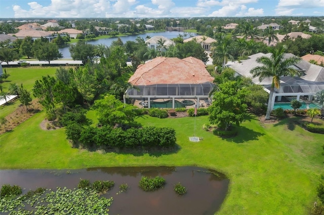 birds eye view of property featuring a water view