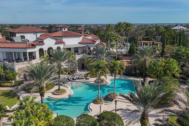 view of pool featuring a patio area