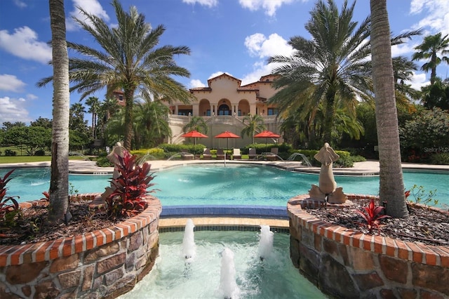 view of pool featuring pool water feature