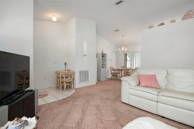 living room featuring lofted ceiling, a notable chandelier, and light colored carpet