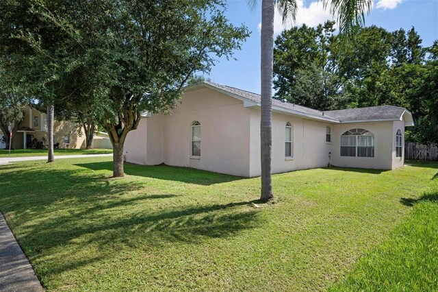 exterior space with a lawn