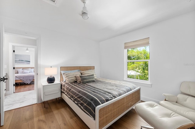 bedroom featuring hardwood / wood-style flooring